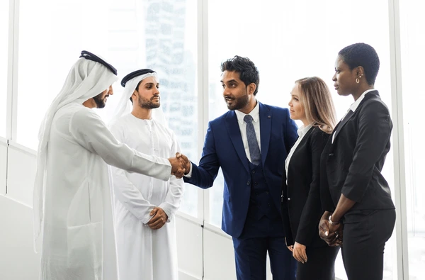 https://brightgate.ae/wp-content/uploads/2025/07/mixed-business-team-dubai-meeting-600nw-2048792924.webp